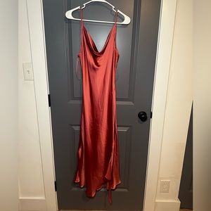 New never worn women’s medium pink satin dress.